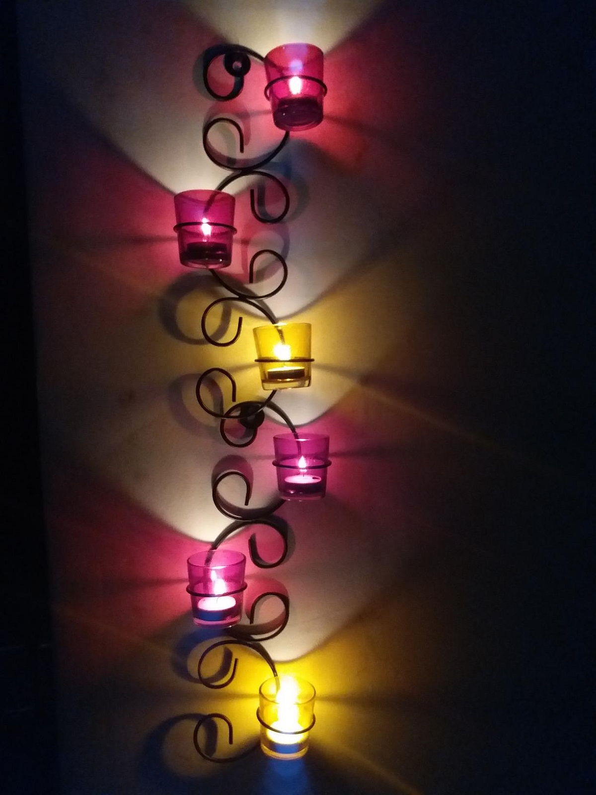 Where do candle holders go on the wall
