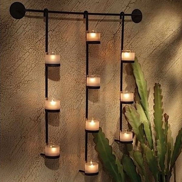 black iron wall candle holder