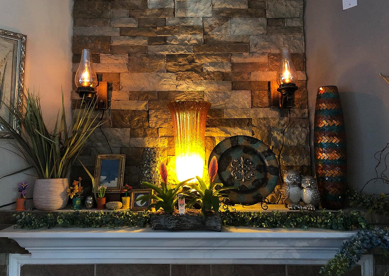Vintage Wall Sconces Atop Fireplace